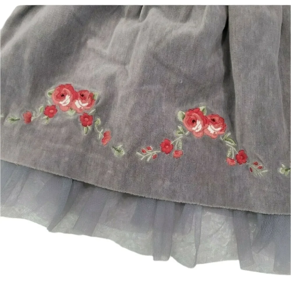 Grey velvet dress with red embroidery accents